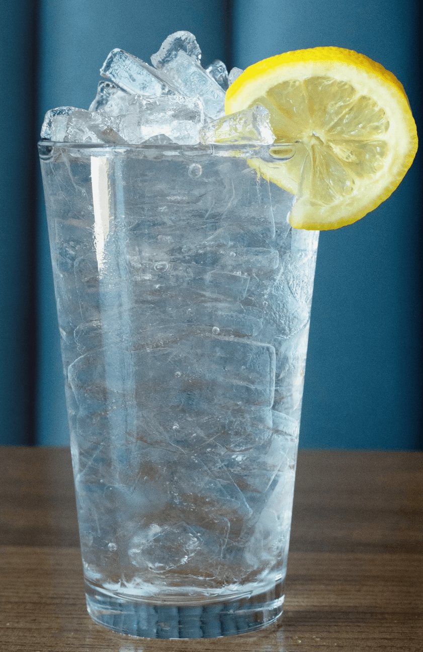 Glass of ice water with lemon