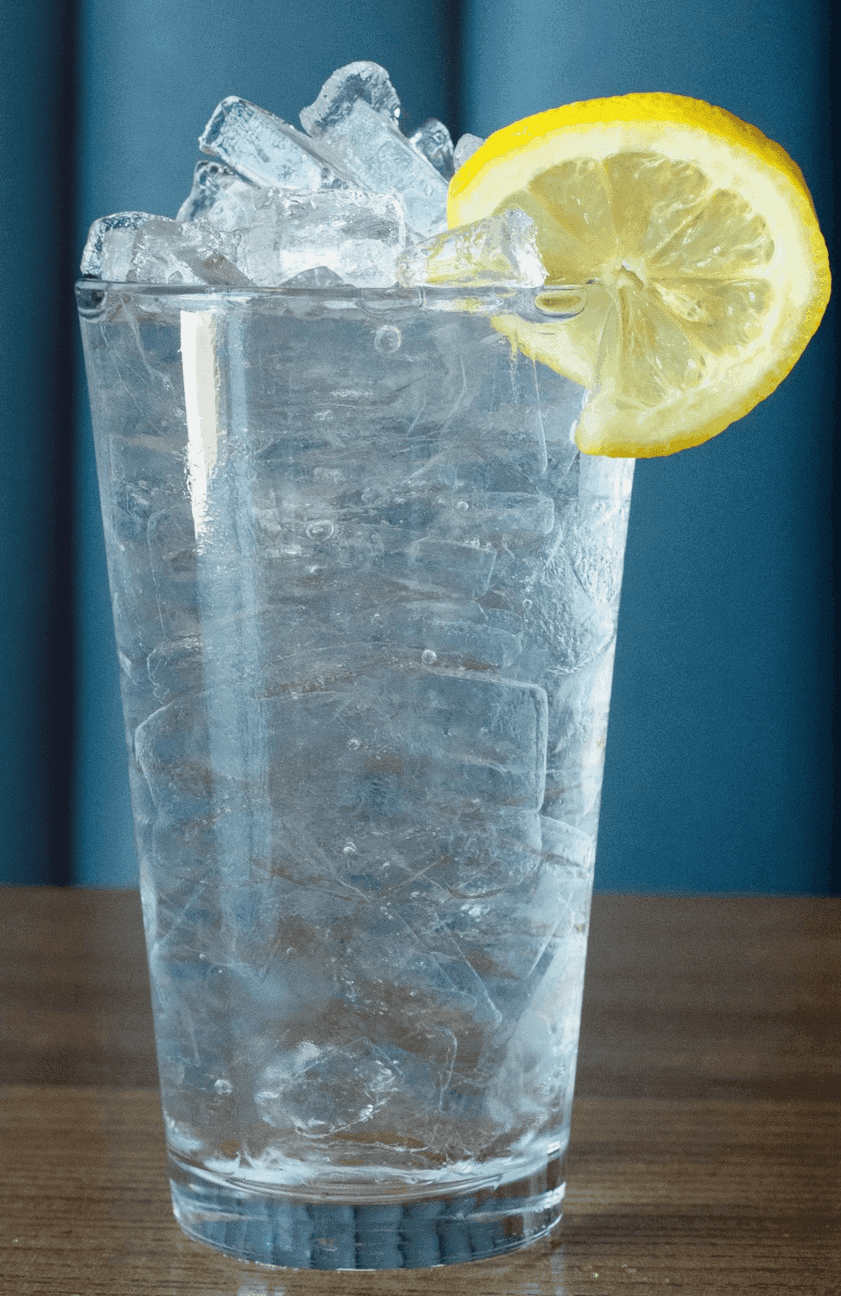 Glass of ice water with lemon